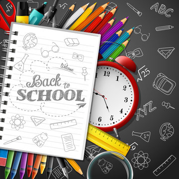 School background with school supplies and paper on black background