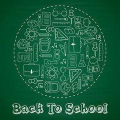 Back to school lettering in doodle circle on blue chalkboard background
