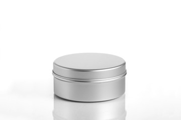 empty aluminum jars cosmetic, lotion packaging on a white background