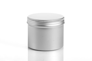 empty aluminum jars cosmetic, lotion packaging on a white background