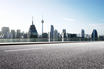 Foto op Plexiglas empty asphalt road with modern buildings © zhu difeng