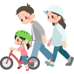 Fototapeta na wymiar バランスバイクに乗る女の子と見守る両親