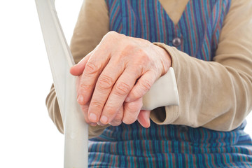 Disabled elderly woman with crutch