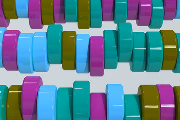 Pattern of blue, violet and green cylinder tablets on white background
