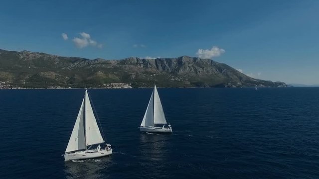Aero shooting of two yachts in the open sea