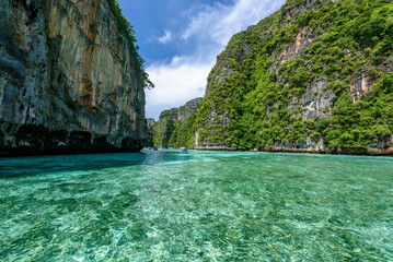 Naklejka na ściany i meble Beautiful crystal clear water at Pileh bay at Phi Phi island near Phuket, Thailand