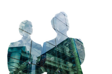 Doble exposure of business person and cityscape.