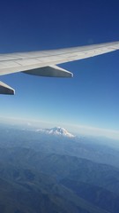 Fototapeta premium Flying over the mountains on a clear day