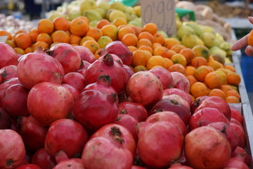 Pomegranate spread on the counter in the market