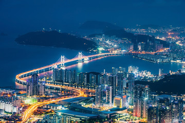 Naklejka premium GwangAn Bridge and Haeundae at night in Busan,Korea