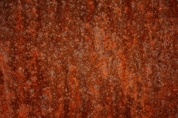 Rusted iron. Dark background. Abstraction.