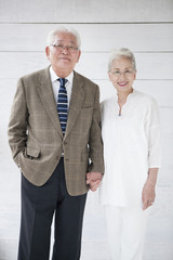 Portfolio of elderly couple connecting hands