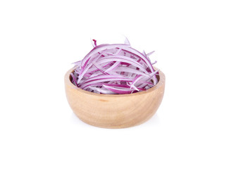 sliced shallot or red onion in wooden bowl on white background