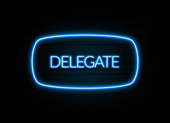 Delegate  - colorful Neon Sign on brickwall