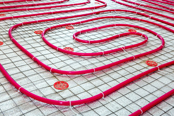Floor heating pipe. Installation of engineering systems in a building.