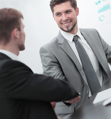 Fototapeta premium Business man shaking hand to partner