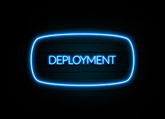 Deployment  - colorful Neon Sign on brickwall