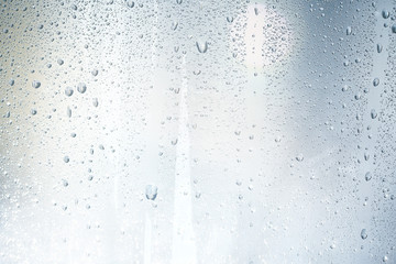 texture of a drop of rain on a glass wet transparent background