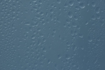 texture of a drop of rain on a glass wet transparent background