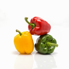 Three sweet pepper on white background.