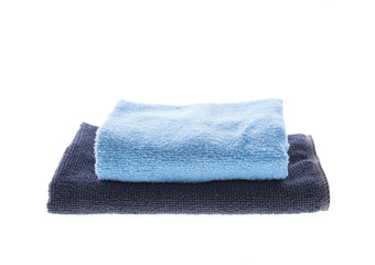 Blue towels folded isolated on white background