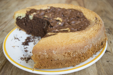 Fototapeta na wymiar sponge cake at the chocolate and vanilla