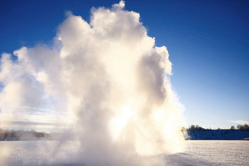 Naklejka na ściany i meble Snow geyser beating with great force