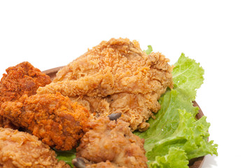 fried chickens on wooden plate