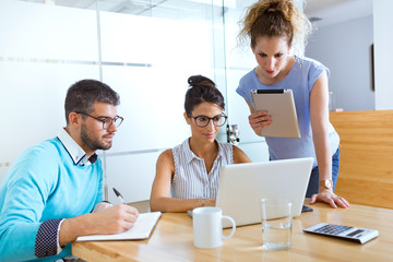 Group of business people working in modern office.