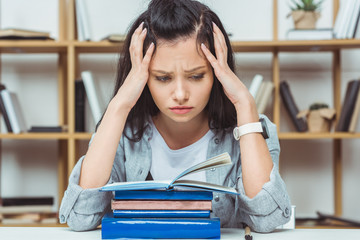 tired student with books