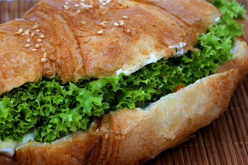 Сroissant lie on a bamboo surface