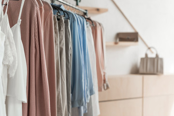 Rack with clothes in store