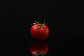 Tomato on black