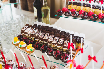 Different kinds of baked sweets on a buffet