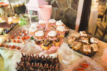 Different kinds of baked sweets on a buffet