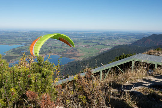 Parasailer coasting in the Bavarian sunshine towards the Forggensee.