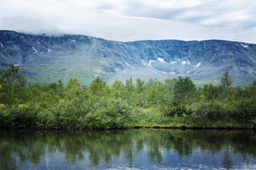 Fototapeta na wymiar Beautiful mountains with a lake