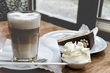 Morning high-calorie breakfast, pastries, meringues and lattes