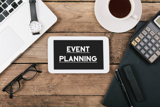 Event Planning text on tablet computer on office desk