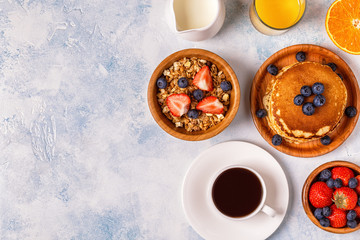 Obraz na płótnie Canvas Delicious breakfast on a light table.