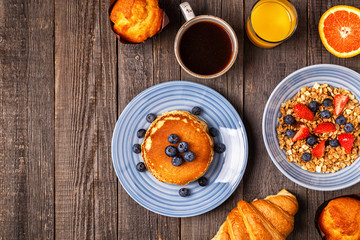 Delicious breakfast on a rustic table.