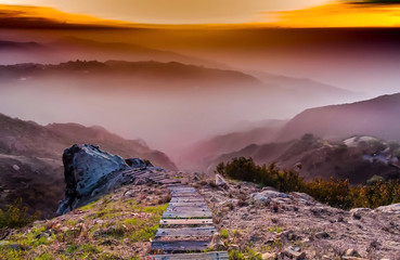 Sunrise view at golden hour from the top of the mountains down into the valleys in Malibu California United States - obrazy, fototapety, plakaty