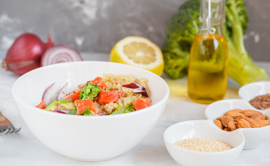 Salad with broccoli, fish and quinoa