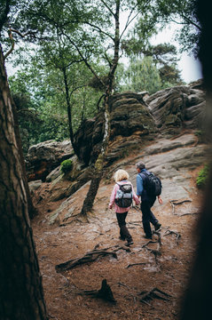 Senior Couple hiking trough forest