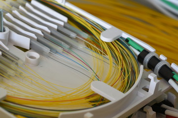 Splicing the fibers on spice tray closeup