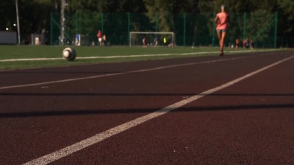 Outdoors activity on sportsground, summer day. - Powered by Adobe