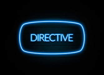 Directive  - colorful Neon Sign on brickwall