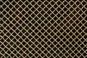 metal mesh or aluminum grid on black background