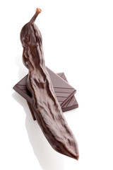 Carob pod and carob chocolate.