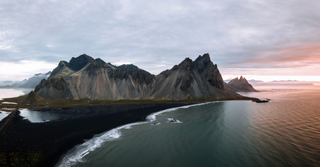 Aerial panorama of the Stokksnes peninsula in Iceland on an overcast day during sunrise